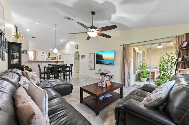 8404 Long Bay, West Palm Beach, FL 33411 - living area featuring arched walkways, ceiling fan, lofted ceiling, plenty of natural light, and recessed lighting