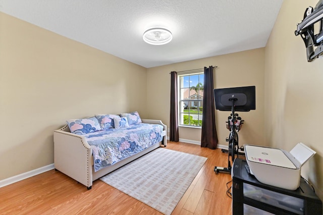 8404 Long Bay, West Palm Beach, FL 33411 - bedroom with light wood-style floors and baseboards