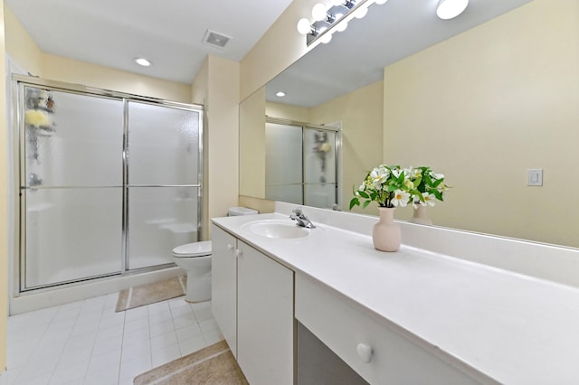 8404 Long Bay, West Palm Beach, FL 33411 - bathroom featuring vanity, a shower stall, tile patterned flooring, and recessed lighting