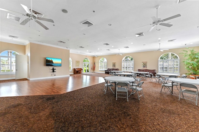8404 Long Bay, West Palm Beach, FL 33411 - dining area featuring ceiling fan, wood finished floors, crown molding, and recessed lighting