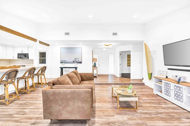 108 Timber Run E, Riviera Beach, FL 33407 - living room featuring light wood-type flooring and recessed lighting