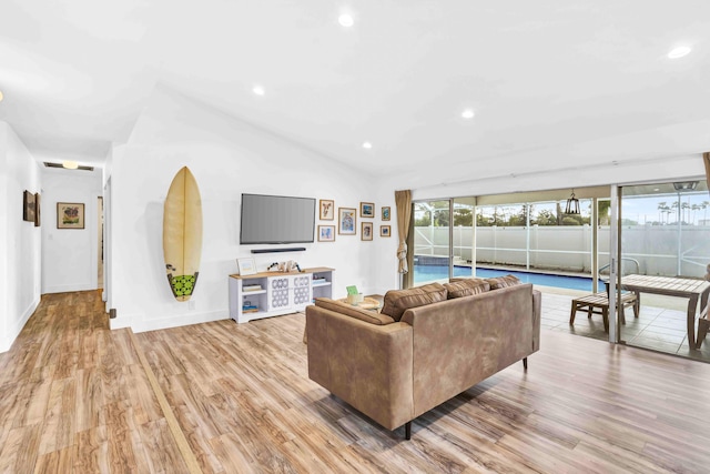 108 Timber Run E, Riviera Beach, FL 33407 - living room with recessed lighting, light wood-type flooring, and lofted ceiling