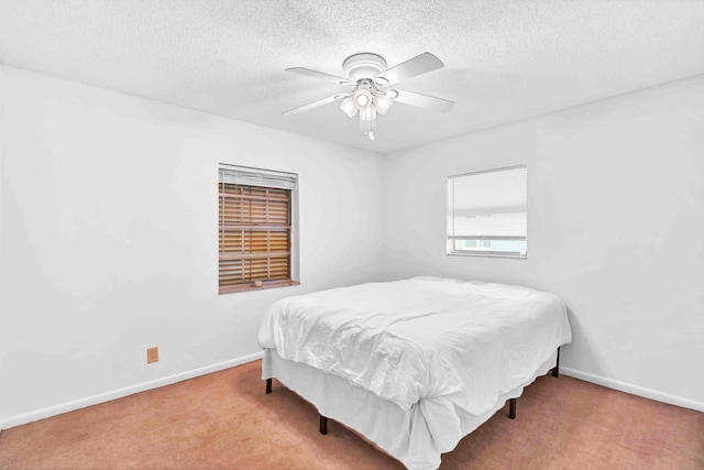 108 Timber Run E, Riviera Beach, FL 33407 - bedroom featuring carpet, a ceiling fan, and a textured ceiling
