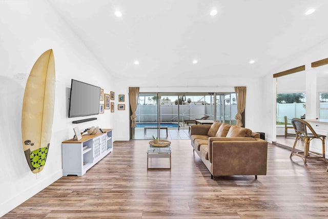 108 Timber Run E, Riviera Beach, FL 33407 - living area with lofted ceiling, recessed lighting, and wood finished floors