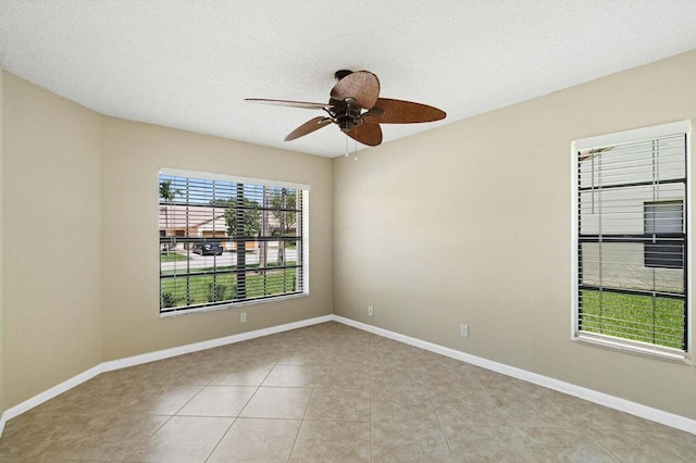 416 Cottonwood Pl, Boca Raton, FL 33431 - unfurnished room with a ceiling fan, tile patterned floors, and a textured ceiling