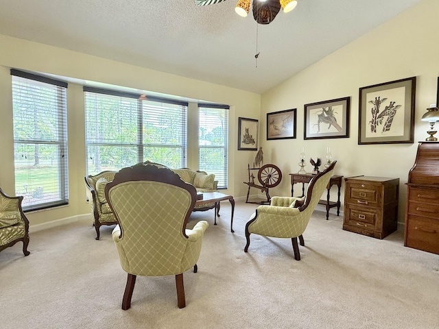 13021 150th Ct N, Jupiter, FL 33478 - sitting room with carpet floors, vaulted ceiling, and ceiling fan