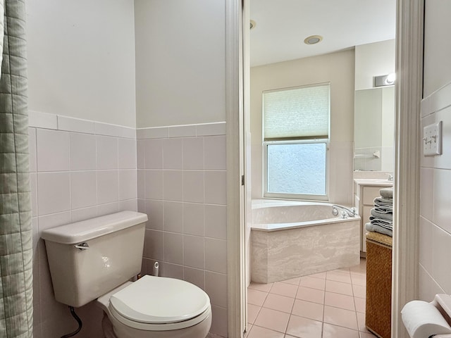 13021 150th Ct N, Jupiter, FL 33478 - full bathroom with a bath, tile walls, tile patterned floors, vanity, and wainscoting