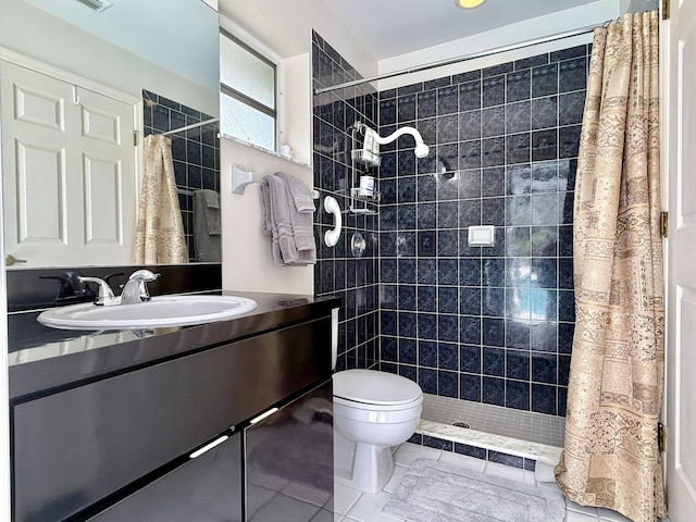 13021 150th Ct N, Jupiter, FL 33478 - bathroom with a tile shower, tile patterned flooring, and vanity