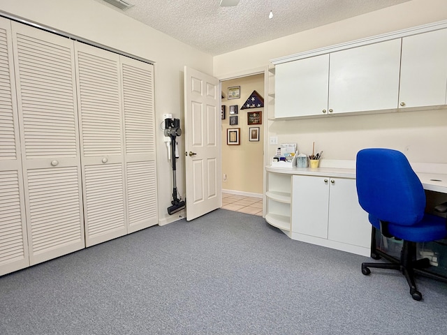 13021 150th Ct N, Jupiter, FL 33478 - office featuring built in study area, a textured ceiling, and light carpet