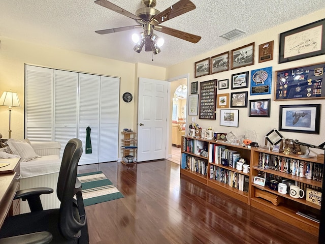 13021 150th Ct N, Jupiter, FL 33478 - office with ceiling fan, a textured ceiling, and dark wood-style floors
