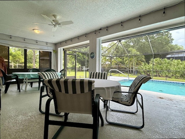 13021 150th Ct N, Jupiter, FL 33478 - sunroom with ceiling fan and a pool