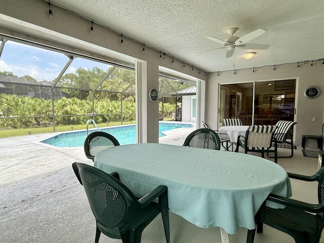 13021 150th Ct N, Jupiter, FL 33478 - dining area featuring a textured ceiling and a ceiling fan