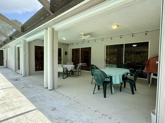 13021 150th Ct N, Jupiter, FL 33478 - view of patio featuring outdoor dining area and a ceiling fan