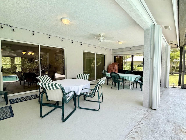 13021 150th Ct N, Jupiter, FL 33478 - view of patio with outdoor dining area and ceiling fan