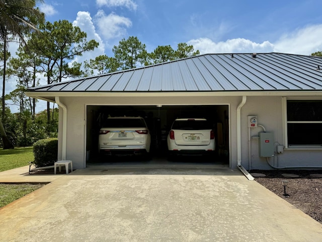 13021 150th Ct N, Jupiter, FL 33478 - garage with concrete driveway