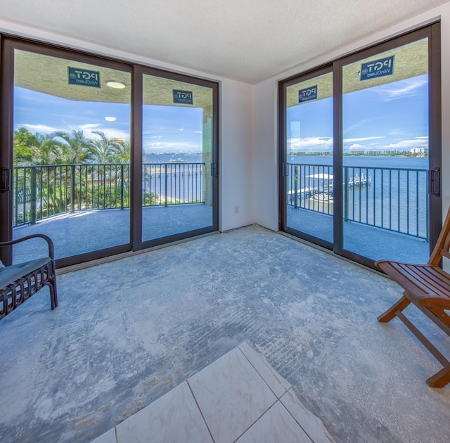 896 N Federal Hwy Unit 324, Lantana, FL 33462 - unfurnished sunroom featuring plenty of natural light