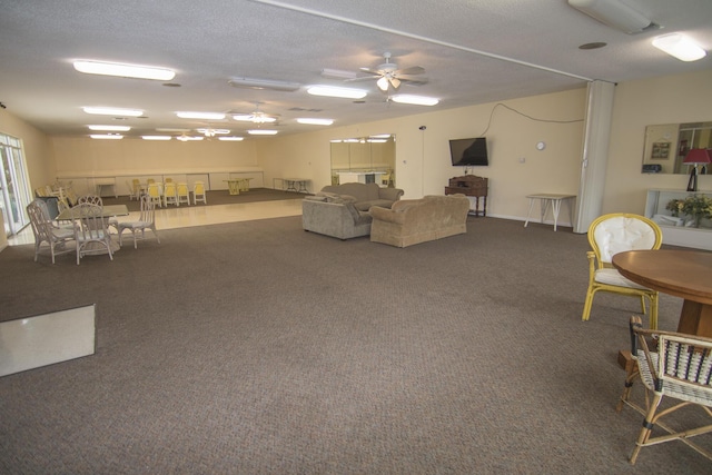 896 N Federal Hwy Unit 324, Lantana, FL 33462 - carpeted living room with a textured ceiling and ceiling fan