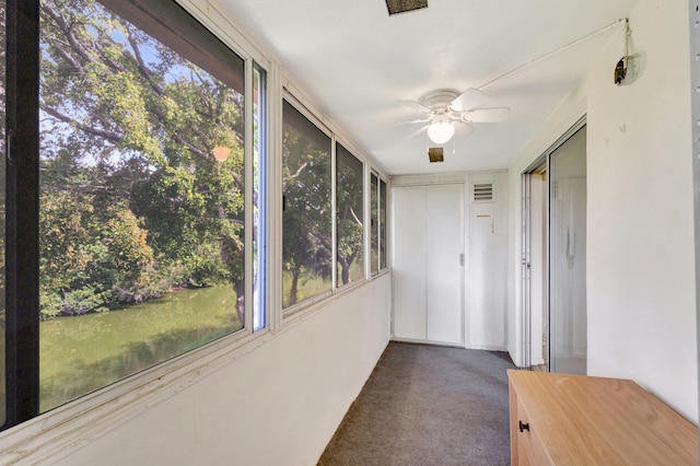 47 Camden Unit B, West Palm Beach, FL 33417 - unfurnished sunroom featuring a ceiling fan and plenty of natural light