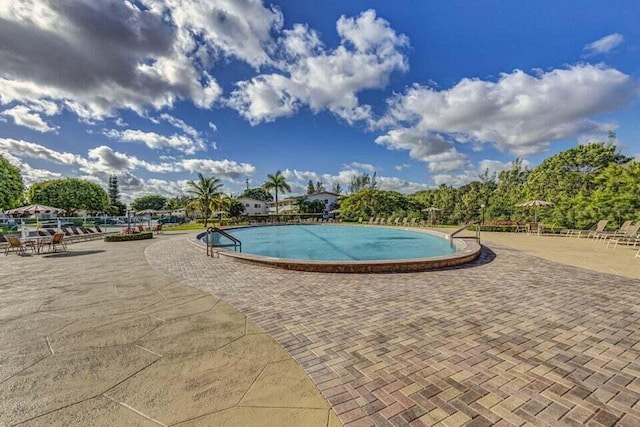 47 Camden Unit B, West Palm Beach, FL 33417 - community pool featuring a patio
