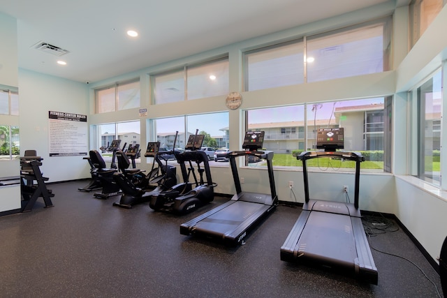 740 Horizons W Unit 207, Boynton Beach, FL 33435 - exercise room featuring plenty of natural light, recessed lighting, and a towering ceiling