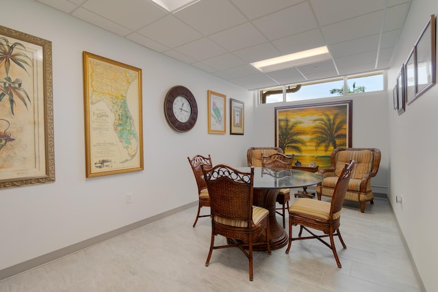 740 Horizons W Unit 207, Boynton Beach, FL 33435 - dining area with a paneled ceiling and baseboards