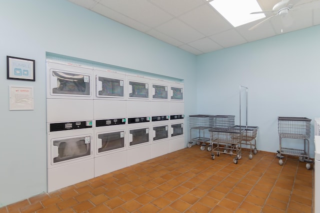 740 Horizons W Unit 207, Boynton Beach, FL 33435 - misc room featuring stacked washer and clothes dryer, ceiling fan, and a drop ceiling