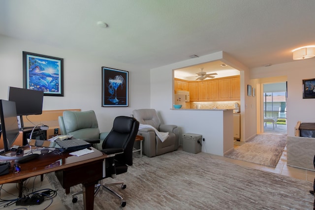 740 Horizons W Unit 207, Boynton Beach, FL 33435 - home office featuring ceiling fan and light tile patterned flooring