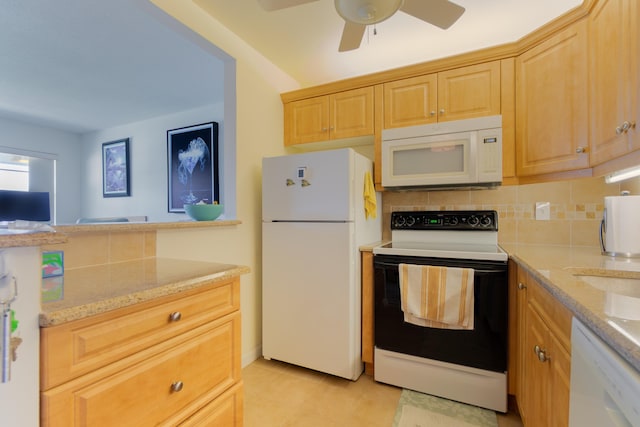 740 Horizons W Unit 207, Boynton Beach, FL 33435 - kitchen featuring white appliances, decorative backsplash, light stone counters, a ceiling fan, and light tile patterned floors