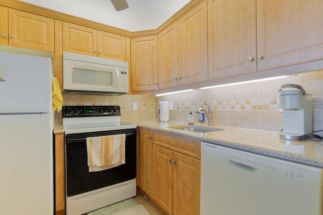 740 Horizons W Unit 207, Boynton Beach, FL 33435 - kitchen featuring white appliances, decorative backsplash, and light stone countertops