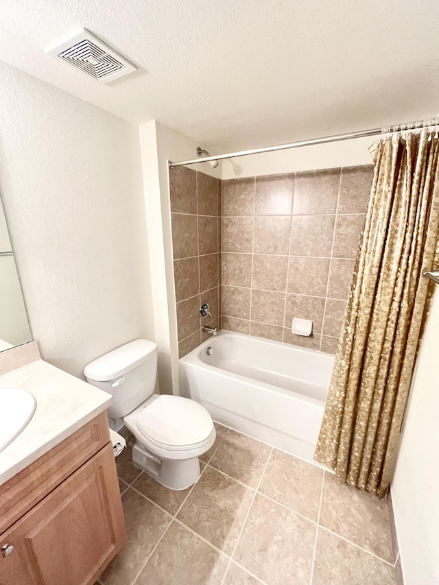 6761 Heritage Grande Unit 3303, Boynton Beach, FL 33437 - bathroom featuring shower / bath combination with curtain, vanity, tile patterned floors, and a textured ceiling