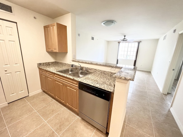 6761 Heritage Grande Unit 3303, Boynton Beach, FL 33437 - kitchen with stainless steel dishwasher, light tile patterned floors, a peninsula, and a ceiling fan