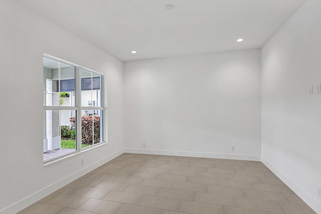 10051 Timber Creek Way, Palm Beach Gardens, FL 33412 - empty room featuring baseboards and recessed lighting