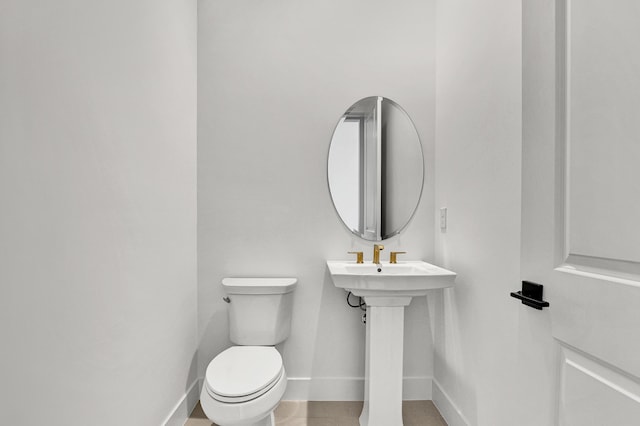 10051 Timber Creek Way, Palm Beach Gardens, FL 33412 - bathroom with toilet and tile patterned floors