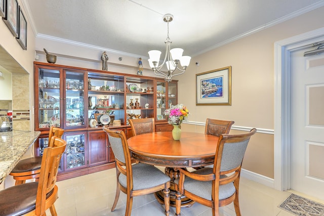 4452 NE Ocean Blvd Unit C2, Jensen Beach, FL 34957 - dining space featuring a chandelier, ornamental molding, and light tile patterned floors