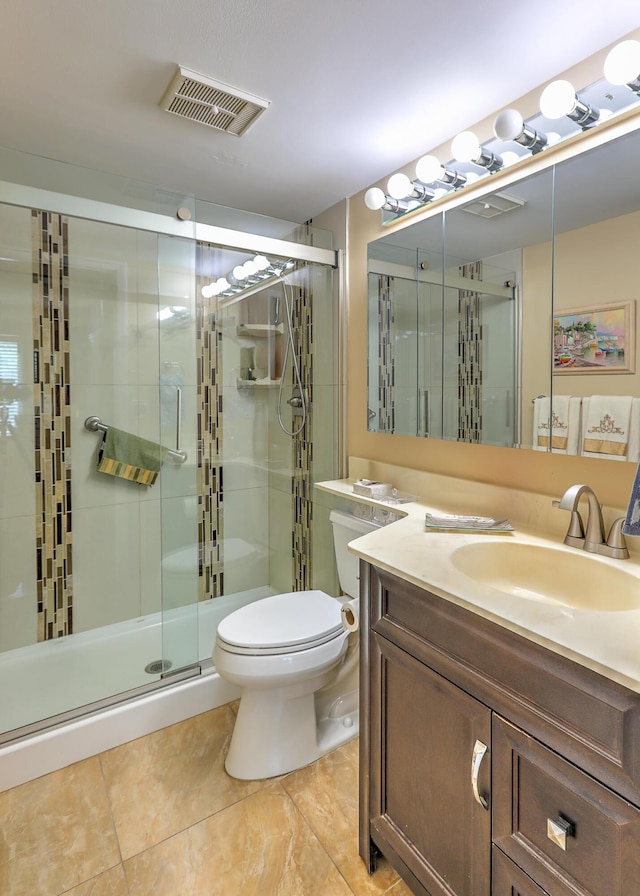 4452 NE Ocean Blvd Unit C2, Jensen Beach, FL 34957 - full bathroom featuring a stall shower, vanity, and tile patterned flooring