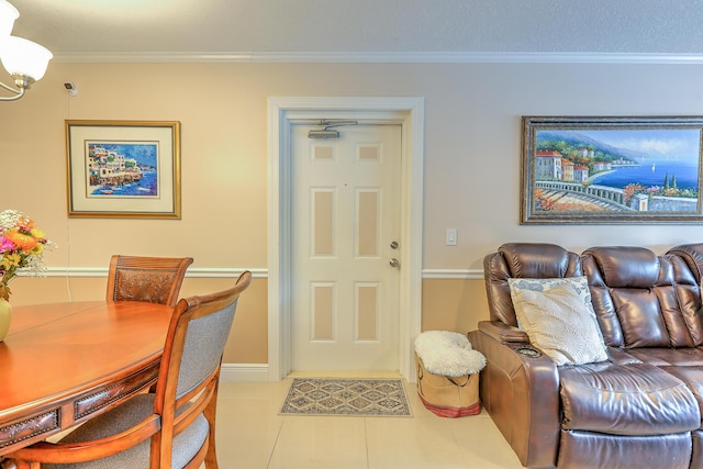 4452 NE Ocean Blvd Unit C2, Jensen Beach, FL 34957 - foyer featuring tile patterned floors, crown molding, and a chandelier