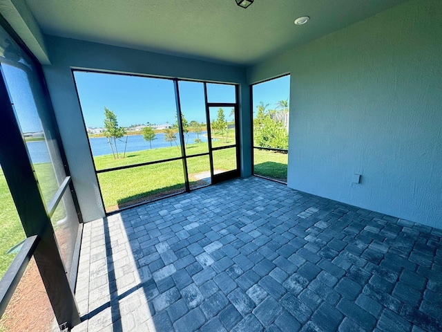 1236 Harper Way Unit 57, Vero Beach, FL 32960 - unfurnished sunroom with a water view