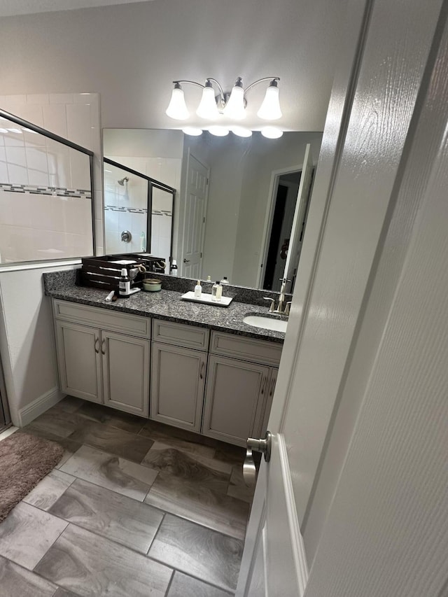 13106 Jeter Creek Dr, Riverview, FL 33579 - bathroom featuring a stall shower and double vanity