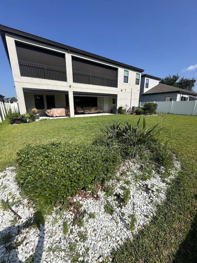 13106 Jeter Creek Dr, Riverview, FL 33579 - rear view of property featuring a balcony and stucco siding