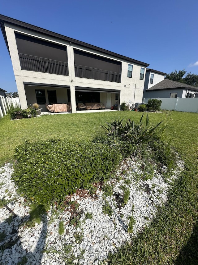 13106 Jeter Creek Dr, Riverview, FL 33579 - back of house with a balcony