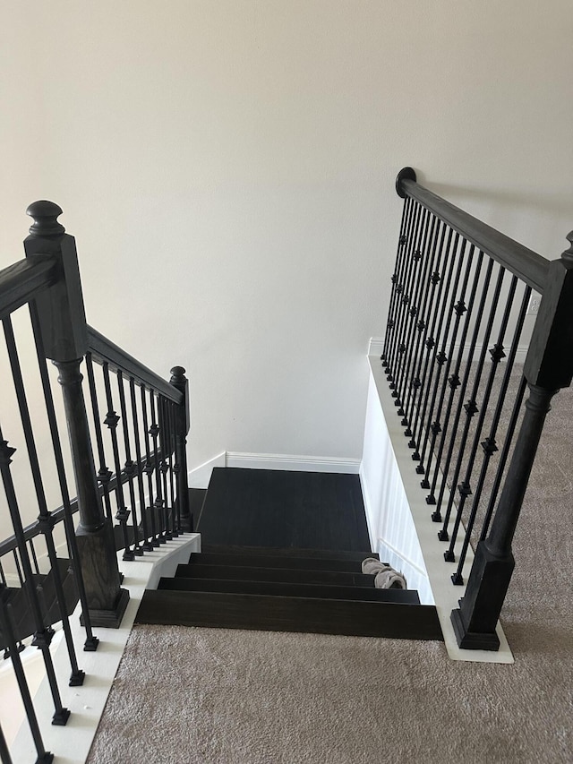 13106 Jeter Creek Dr, Riverview, FL 33579 - staircase featuring carpet flooring and baseboards