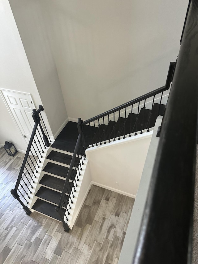13106 Jeter Creek Dr, Riverview, FL 33579 - staircase with wood finished floors and baseboards