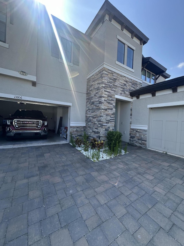 13106 Jeter Creek Dr, Riverview, FL 33579 - view of front of home with stone siding and stucco siding