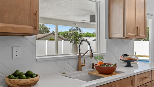 2654 NW 32nd St, Boca Raton, FL 33434 - kitchen view of light stone countertops and ceiling fan