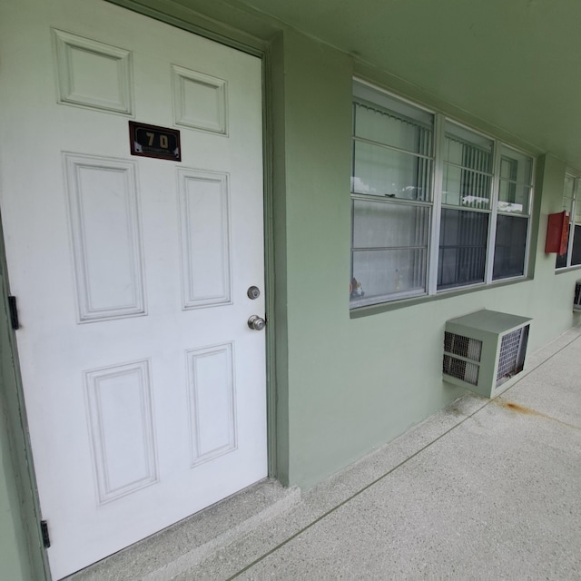 70 Easthampton C, West Palm Beach, FL 33417 - entrance to property featuring stucco siding
