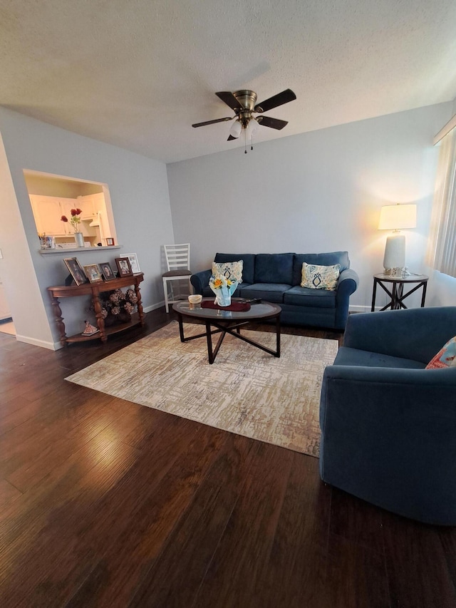 70 Easthampton C, West Palm Beach, FL 33417 - living room with wood finished floors, a ceiling fan, and a textured ceiling