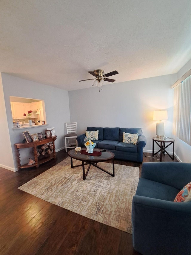 70 Easthampton C, West Palm Beach, FL 33417 - living area featuring wood finished floors, ceiling fan, and a textured ceiling