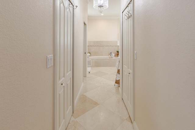 1101 SW Kickaboo Rd, Port Saint Lucie, FL 34953 - hall with ornamental molding and a chandelier