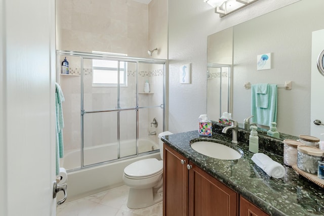 1101 SW Kickaboo Rd, Port Saint Lucie, FL 34953 - bathroom with vanity, enclosed tub / shower combo, and a textured wall