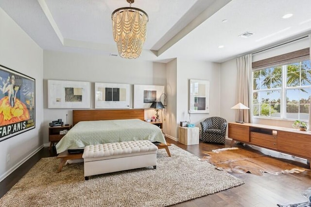242 Tresana Blvd Unit 70, Jupiter, FL 33478 - bedroom featuring a chandelier and wood finished floors